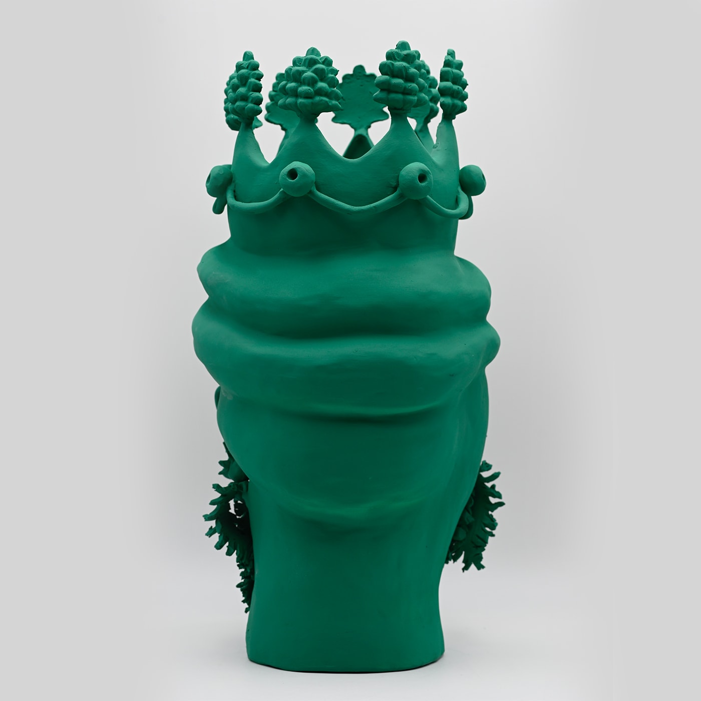 Zielona rzeźba Głowa Maura