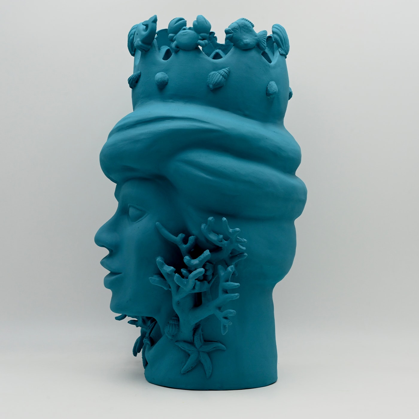 Ręcznie wykonana turkusowa rzeźba Głowa Maura