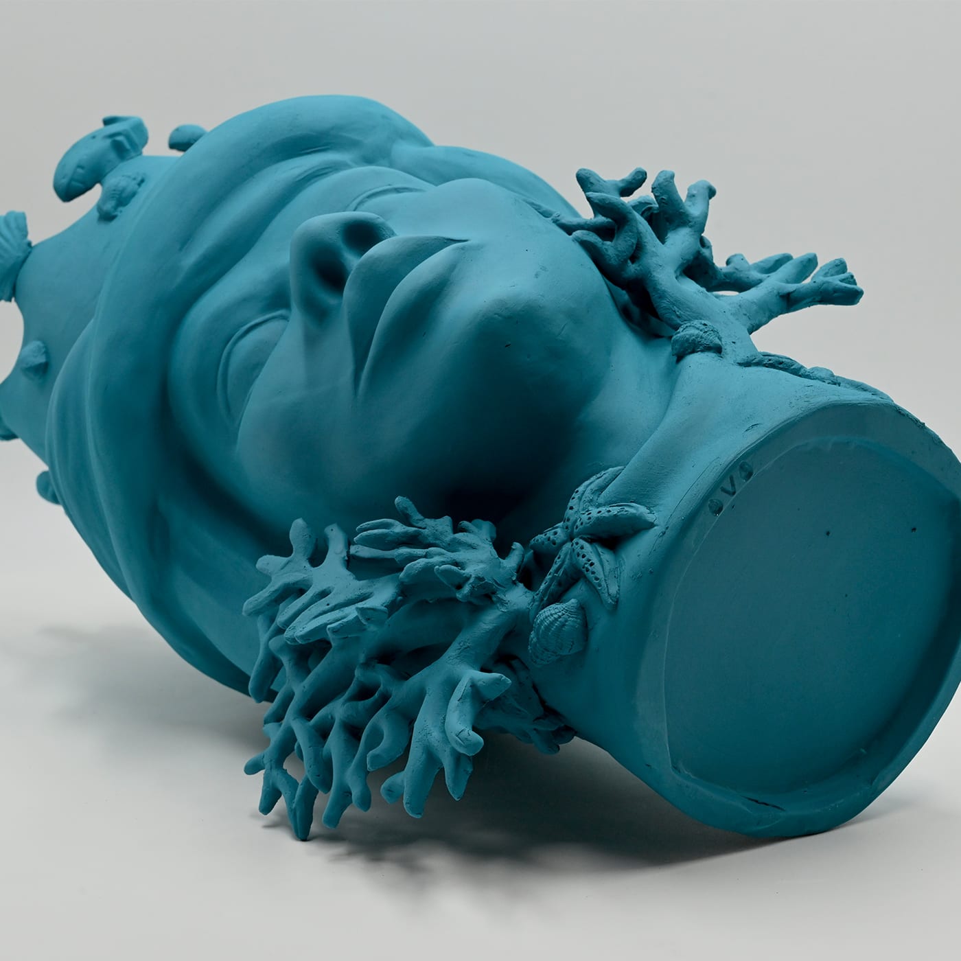 Ręcznie wykonana turkusowa rzeźba Głowa Maura