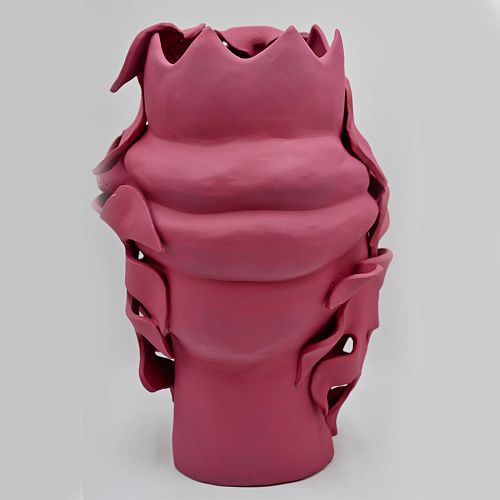 Różowa rzeźba Głowa Maura